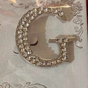 Elegant rhinestone letter “G” brooch Silvertone